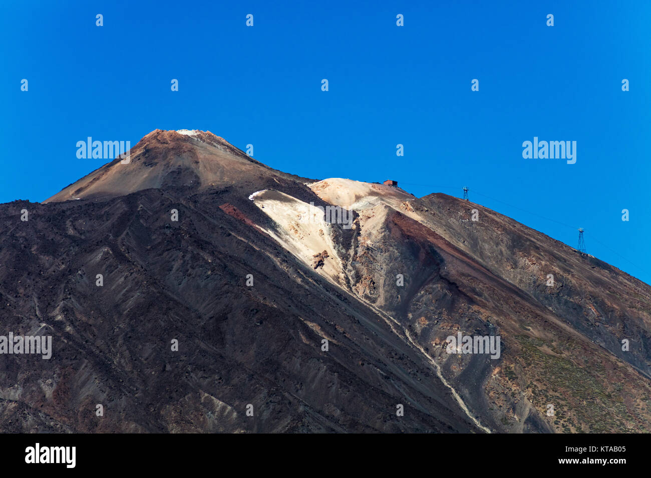 An uphill view of `Pico del Teide', the colourful Teide volcano in Teide National Park, Tenerife, Canary Islands. Stock Photo